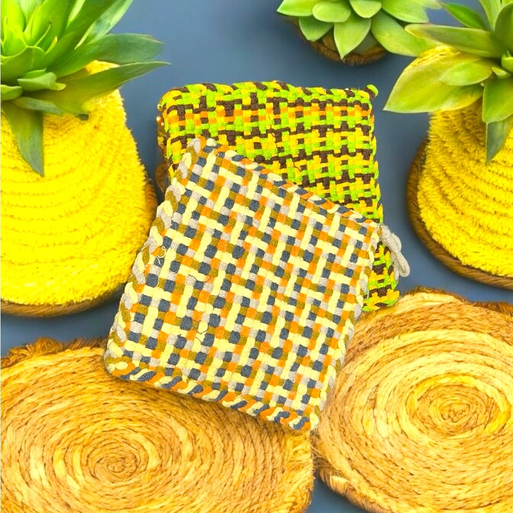 Handmade pair of colorful woven potholders. Thick 10 by 10 inches.